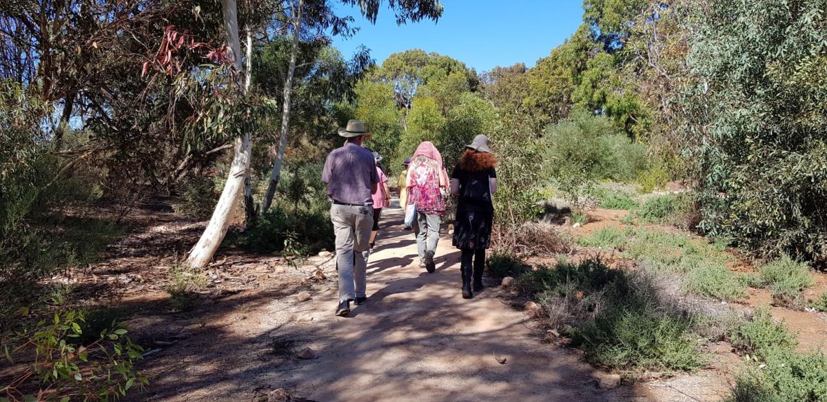 Eco Coffin Project participants walking through Pilyu Yarta Natural Burial Ground during our site visit 2020